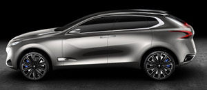 
Vue de profil de la Peugeot SXC Concept de 2011. Des lignes fluides, qui rappellent celles de la Volvo XC60.
 